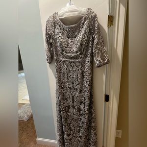 Gorgeous mother of the bride evening gown. Never worn with tags, unaltered.